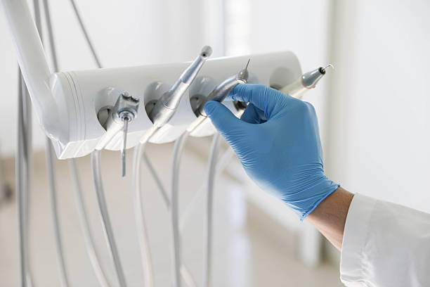 Professional Invisalign Clear Aligners technician working in Clinton, MS